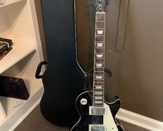 #35	Les Paul Epiphone guitar with stand and hard case	 SOLD
