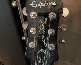 #35	Les Paul Epiphone guitar with stand and hard case	SOLD
