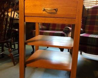$175. (Photo #1) Kitchen Island rolling cart with granite top. Oak. Approx 24-in. square top. Drawer at top will slide out both sides. Heavy wooden piece. Gentle wear but great condition.