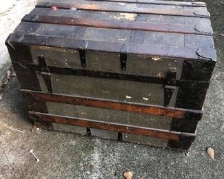 Antique Steamer Trunk. (photo #4) Collector’s item. Believed to be post Civil War. Wood & metal. Flat top, body supported with wood slats, hasp lock, triangular hinges, casters, leather handles, paper lining which was common through the late 1800s. - $300.