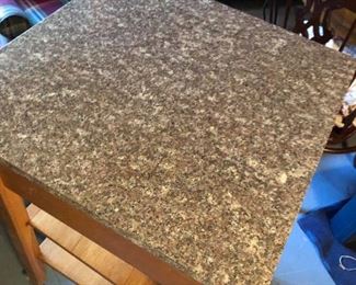 $175. (Photo #2) Kitchen Island rolling cart with granite top. Oak. Approx 24-in. square top. Drawer at top will slide out both sides. Heavy wooden piece. Gentle wear but great condition.