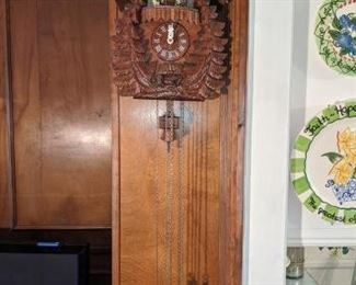 RARE (Photo #2) $380 - Goebel Hummel Dancing Figurines Musical Cuckoo Clock. Regula German Black Forest animated Swiss musical chalet Cuckoo Clock with dancing Hummel Goebel figurines. Deeply carved with a classic chalet design and wonderful detail. But what really makes this cuckoo clock stand out is the rare and adorable Hummel characters ! (see pics). Each figurine is stamped M.J. Hummel Goebel. The maker on this stunning Cuckoo Clock is Regula and is stamped 25 / 1-P. (not sure but assuming that this is the model and or the mechanism number.) Other numbers found on the brass mechanism are stamped G.M. 186 this may be the patent numbers for the mechanism. Also stamped, Made in Germany. Clock face, hands, pendulum, pine cone weights and figurines are in very good condition. The only minor cosmetic issue on this clock is down at the base. The small birds have chipped/broken and repaired wing tips. These are very small birds so you really don't notice it unless you get up very close