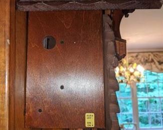 RARE (Photo #4) $380 - Goebel Hummel Dancing Figurines Musical Cuckoo Clock. Regula German Black Forest animated Swiss musical chalet Cuckoo Clock with dancing Hummel Goebel figurines. Deeply carved with a classic chalet design and wonderful detail. But what really makes this cuckoo clock stand out is the rare and adorable Hummel characters ! (see pics). Each figurine is stamped M.J. Hummel Goebel. The maker on this stunning Cuckoo Clock is Regula and is stamped 25 / 1-P. (not sure but assuming that this is the model and or the mechanism number.) Other numbers found on the brass mechanism are stamped G.M. 186 this may be the patent numbers for the mechanism. Also stamped, Made in Germany. Clock face, hands, pendulum, pine cone weights and figurines are in very good condition. The only minor cosmetic issue on this clock is down at the base. The small birds have chipped/broken and repaired wing tips. These are very small birds so you really don't notice it unless you get up very close