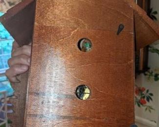 RARE (Photo #5) $380 - Goebel Hummel Dancing Figurines Musical Cuckoo Clock. Regula German Black Forest animated Swiss musical chalet Cuckoo Clock with dancing Hummel Goebel figurines. Deeply carved with a classic chalet design and wonderful detail. But what really makes this cuckoo clock stand out is the rare and adorable Hummel characters ! (see pics). Each figurine is stamped M.J. Hummel Goebel. The maker on this stunning Cuckoo Clock is Regula and is stamped 25 / 1-P. (not sure but assuming that this is the model and or the mechanism number.) Other numbers found on the brass mechanism are stamped G.M. 186 this may be the patent numbers for the mechanism. Also stamped, Made in Germany. Clock face, hands, pendulum, pine cone weights and figurines are in very good condition. The only minor cosmetic issue on this clock is down at the base. The small birds have chipped/broken and repaired wing tips. These are very small birds so you really don't notice it unless you get up very close