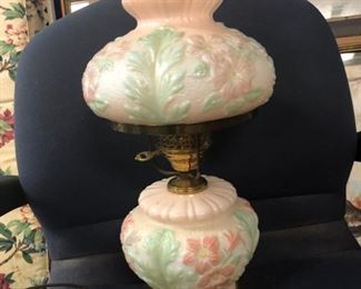 Vintage oil lamp style decorative electric lamp, milk glass with raised painted flowers on the base and shade. Clear glass chimney. $45 (Photo #1)