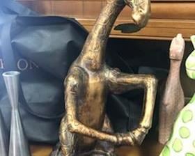 Bronze/gold colored giraffe wine holder - $35