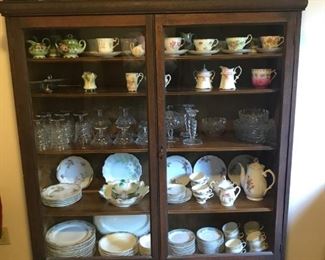 Victorian 2 door over 2 drawer oak bookcase with original hardware, original finish & adjustable shelves. 48" W x 70" H.