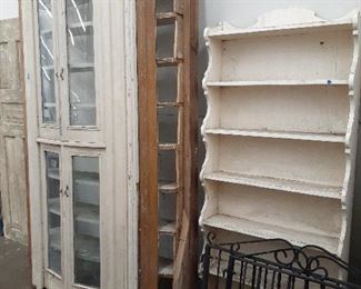 built in hutch, book case, wrought iron gates