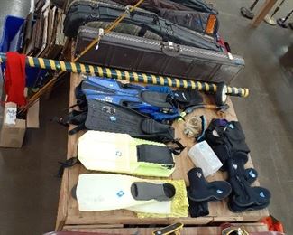 gun cases, fishing, Burton snowboard, diving fins