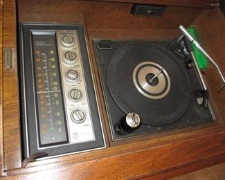 Radio works, one speaker has treble issues but there is an extra speaker that was never installed, turntable needs work.