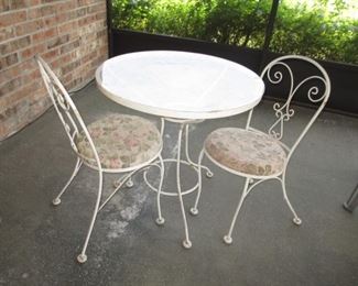 Super cute bistro set.  Has plexiglass top.  Keep as is or add glass.