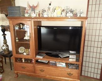 Entertainment center, currently holding a 42" TV.