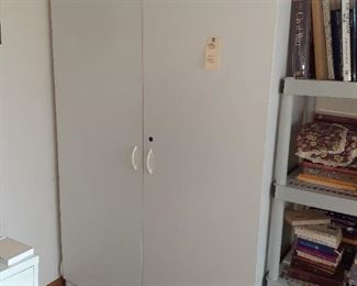 Large storage cabinet.  No attached back so meant to have on a good flat wall.