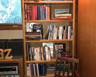 Lots of books on various subjects including war planes, airplanes, World War II, the Civil War, hunting, The Beatles, Hendrix, Elvis & more! (bookshelf not for sale)
