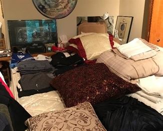 Pillows, linens, currency artwork