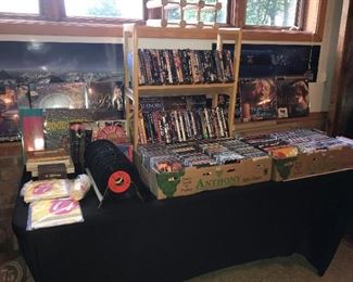 CDs, DVDs, laser discs, posters, 45s, music books