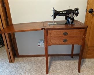 Vintage Premier sewing machine with cabinet