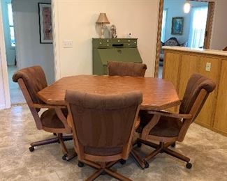 Table / 4 Caster Chairs
$450.00