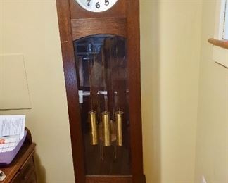 $350 Grandfather clock with Australian works.  20.5" W, 10" D, 78" H. 