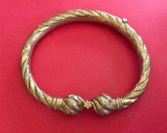 $20 Gold tone twisty bangle bracelet 
