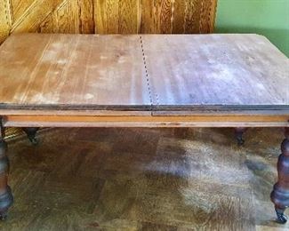 $350 Antique Australian pine dining table with crank -AS IS 65" long (80" L extended  with leaf) by 42" W by 30" H