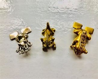$85 all 3 pre-Colombian replica pieces.  Sterling silver frog pendant, $40,  $20 kneeling animal, $25 Frog pin or pendant 