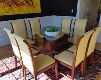 $750 / Square glass top dining room table with wood base and 8 chairs in a light yellow suede. Some of the chairs have some very faint stains, but in overall great condition.  Measurements: 59" square table top, table height 30", chair seat 17", chair back 40"