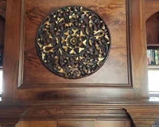 $28 / Carved, decorative wood medallion in dark wood with gold accents.  This item does have some damage where it has been reglued, but nothing super noticeable when hanging on the wall.  Measures: 35.5" round