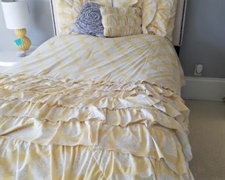 $35 / Adorable pale yellow and white ruffle bedding.  Full size. Includes throw pillows and white ruffle bed skirt. 