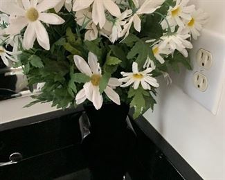 $15 / Black vase with daisy arrangement
