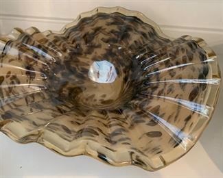 $28 / Decorative art glass bowl in browns. Measures 13" across