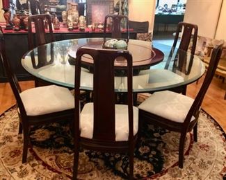 solid rosewood dining table with 8 chairs...excellent condition $1500.00