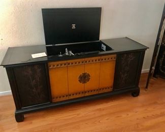 Mid century RCA record player in asian cabinet...excellent condition. $250.00