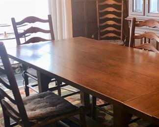 Trestle table & 8 chairs in excellent shape 
