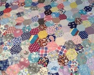 unfinished quilt top of many vintage pieces