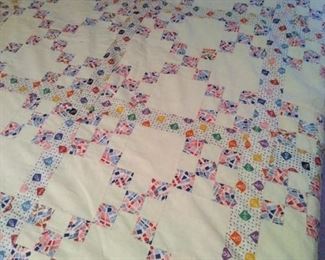unfinished quilt top in neutral and multicolor