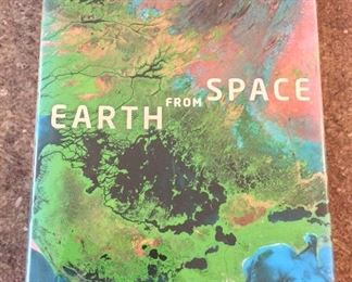 Earth from Space, Yann Arthus-Bertrand, Abrams. ISBN 9781419709623. In Protective Mylar Cover.
