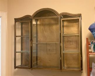 Lot #813 - $250 - Antique Metal Wall Display Cabinet / Curio with Glass Shelves (35" L x 8" W x 31" H)