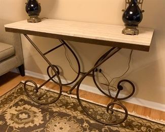 Lot #815 - $150 - Console Table with Metal Scroll Base, Stone Top (48" L x 18" W x 31" H)