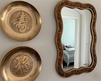Oriental brass dishes and gold tone mirror