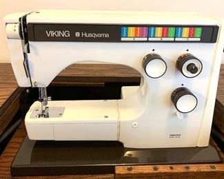 Viking sewing machine and cabinet-open