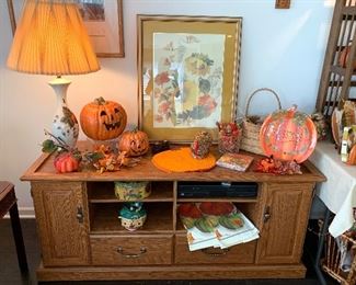 Halloween items on top of Oak TV stand
