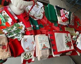Lots of wonderful new and like new Christmas linens 