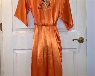 Orange nylon robe with embroidered dragon