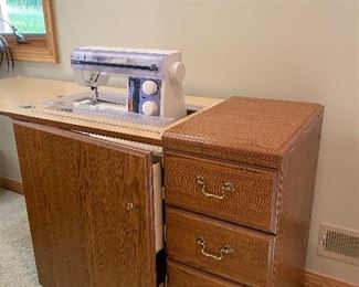 Husqavarna Viking sewing machine and sewing cabinet 