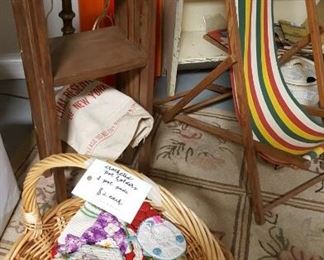 Crocheted hot pads, small mission shelf, child's beach chair