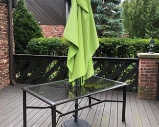 Patio table with umbrella and stand