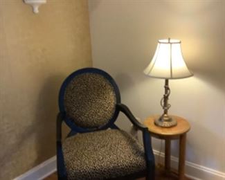 Animal print chair, pair of gold lamps
