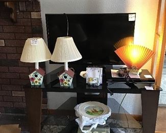 Tv, TV Stand, DVD Player, lights and Collector Plates