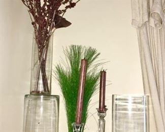 Many candle sticks, vases and decor